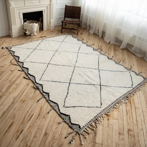 Used Handwoven Moroccan Wool Area Rug 6.5' x 10' for sale on AptDeco