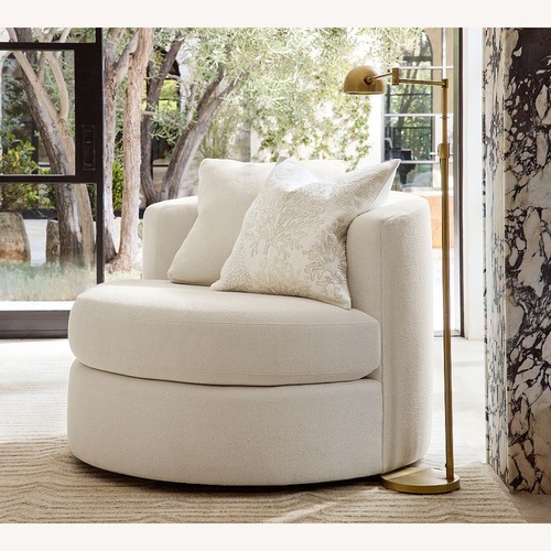 Used Pottery Barn Balboa Grand Swivel Chair for sale on AptDeco