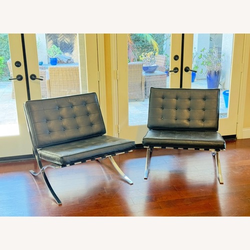 Used Vintage/Antique Black Leather Accent Chairs for sale on AptDeco