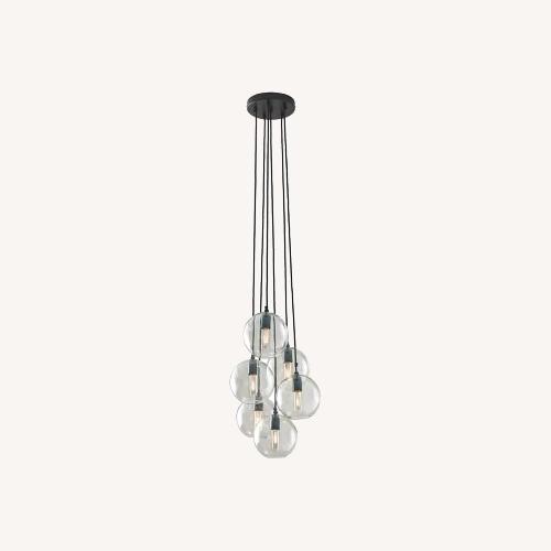 Used Signature Design Sybil Glass Ceiling Lamp for sale on AptDeco