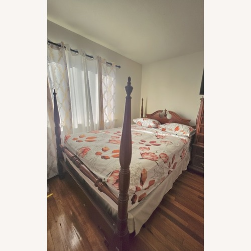 Used Vintage/Antique Finds Dark Brown Wood Queen Bed for sale on AptDeco