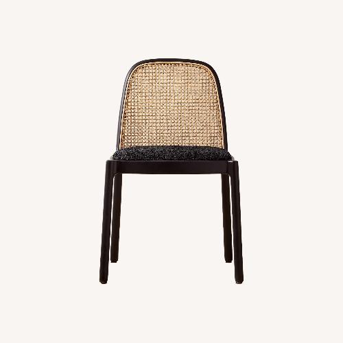 Used CB2 Nadia Black Rattan Dining Chairs for sale on AptDeco