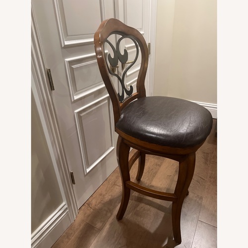 Used Hillsdale Furniture Dark Brown Swiveling Barstools for sale on AptDeco