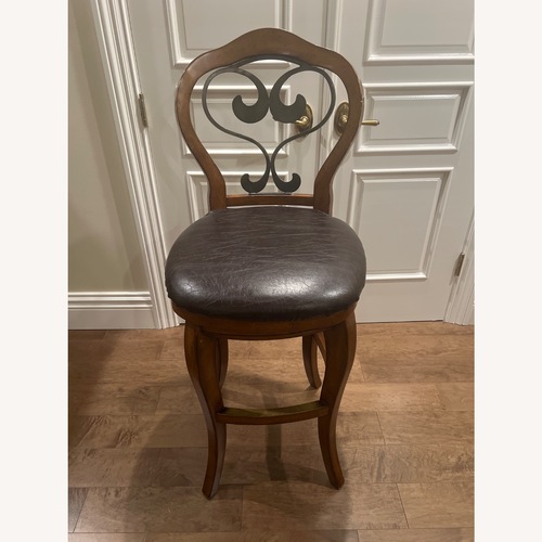 Used Hillsdale Furniture Dark Brown Swiveling Barstools for sale on AptDeco