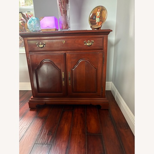 Used Dark Brown Wood Sideboard for sale on AptDeco