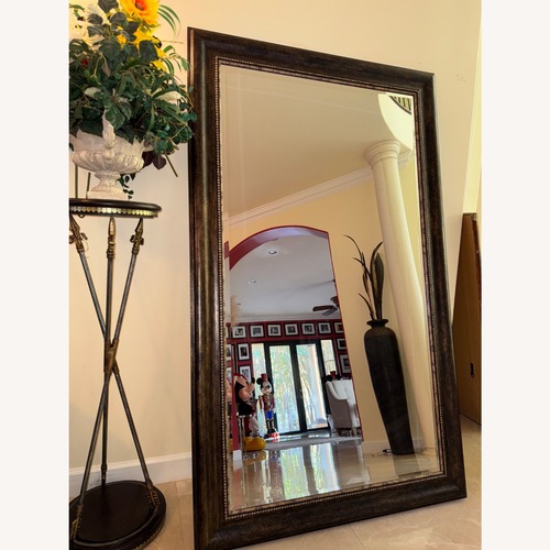 Used Dark Brown Wood Wall Mirror for sale on AptDeco