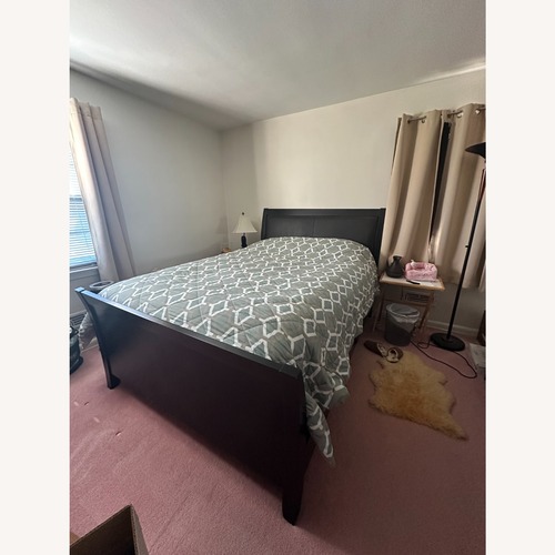 Used Dark Brown Wooden Queen Bed Frame for sale on AptDeco