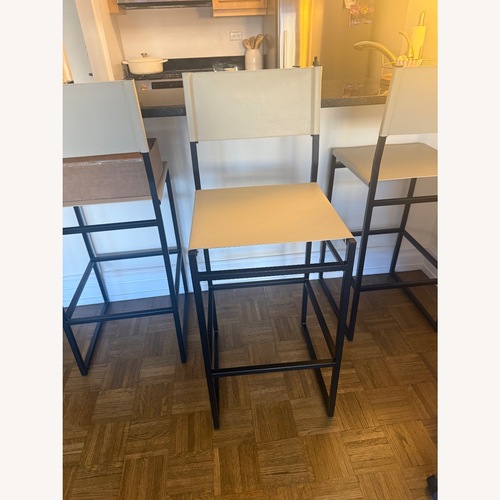 Used Pottery Barn Hardy White Leather Stools for sale on AptDeco