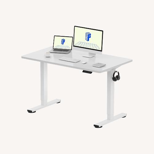 Used FLEXISPOT EN1 One-Piece Standing Desk for sale on AptDeco