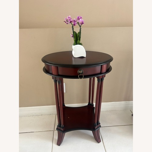 Used The Bombay Company Dark Brown Wood Side Table for sale on AptDeco