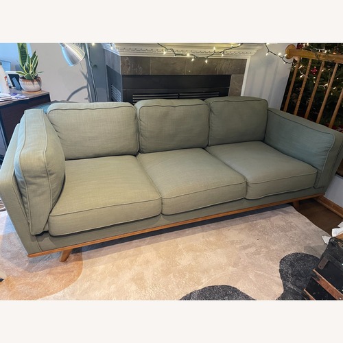 Used Article Timber Green Fabric 3+ Seater Sofa for sale on AptDeco