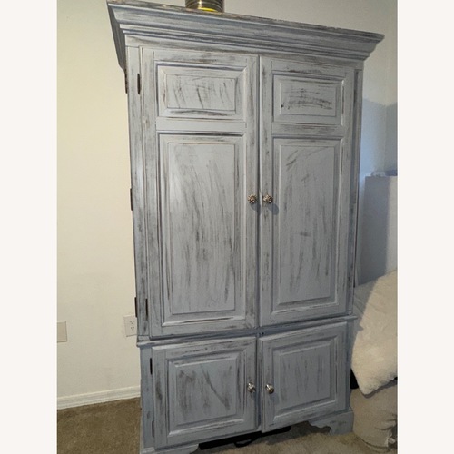 Used Light Gray Wood Armoire for sale on AptDeco