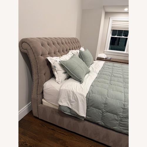 Used Jordan’s Custom Upholstered King Sleigh Bed for sale on AptDeco
