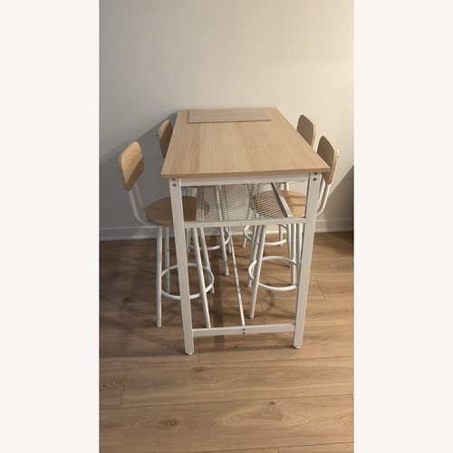 Used Natural Aluminum Dining Set for sale on AptDeco