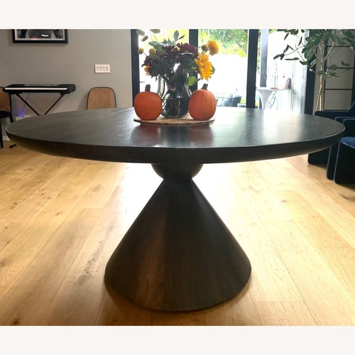 Used Four Hands Dark Brown Wood Dining Table for sale on AptDeco