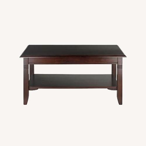 Used Black Wood Coffee Table for sale on AptDeco