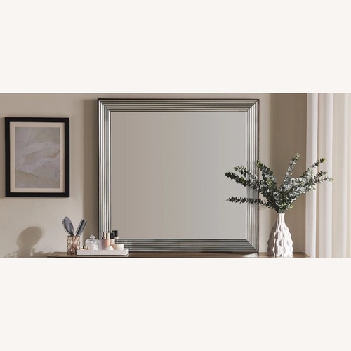 Used Dark Brown Glass Mirror for sale on AptDeco