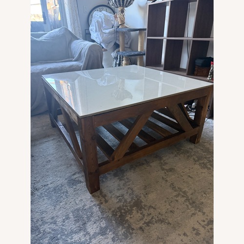 Used Square Marble Table With Wood Base for sale on AptDeco