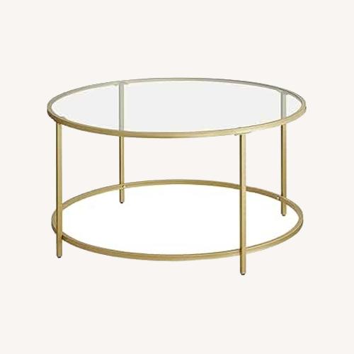 Used Amazon Glass and Gold Coffee Table for sale on AptDeco
