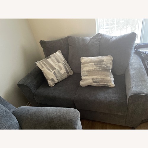 Used Signature Design Light Gray Loveseat for sale on AptDeco