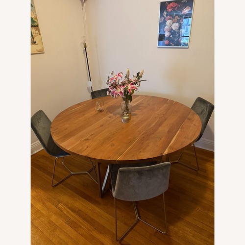 Used Crate & Barrel Round Acacia Dining Table for sale on AptDeco