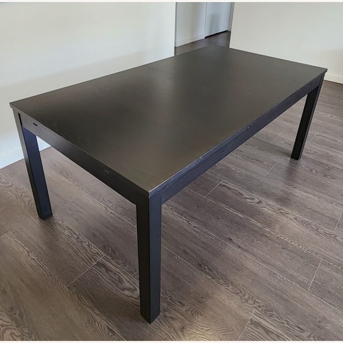 Used IKEA Dark Brown Dining Table for sale on AptDeco