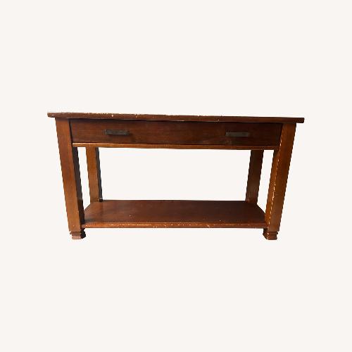 Used Pottery Barn Dark Brown Wood Side Table for sale on AptDeco