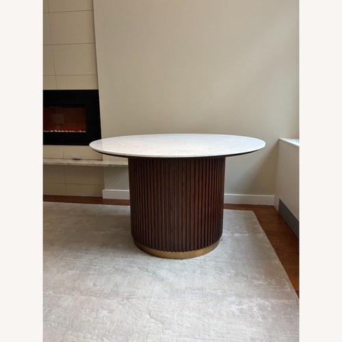Used Arhaus Finnley Round Dining Table 48" for sale on AptDeco