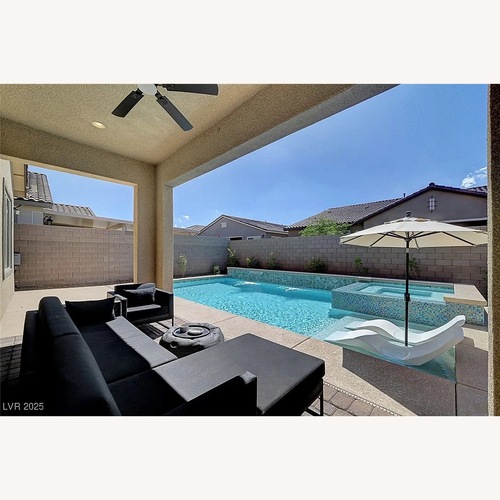 Used Crate & Barrel Dune Black Outdoor Chair for sale on AptDeco