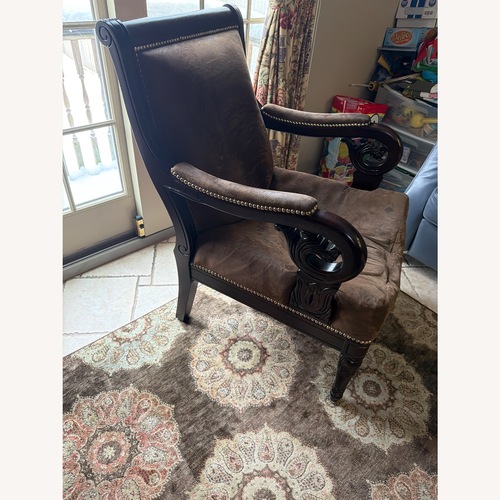 Used Raymour & Flanigan Dark Brown Wood Armchair for sale on AptDeco