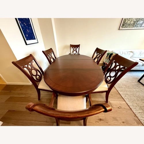 Used Legacy Classic Expandable Dining Set + 6 Chairs for sale on AptDeco