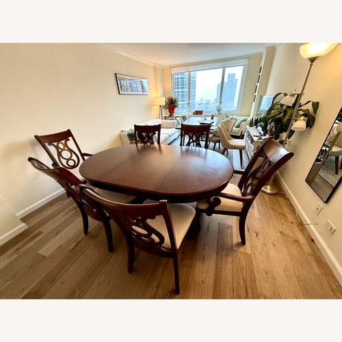 Used Legacy Classic Expandable Dining Set + 6 Chairs for sale on AptDeco