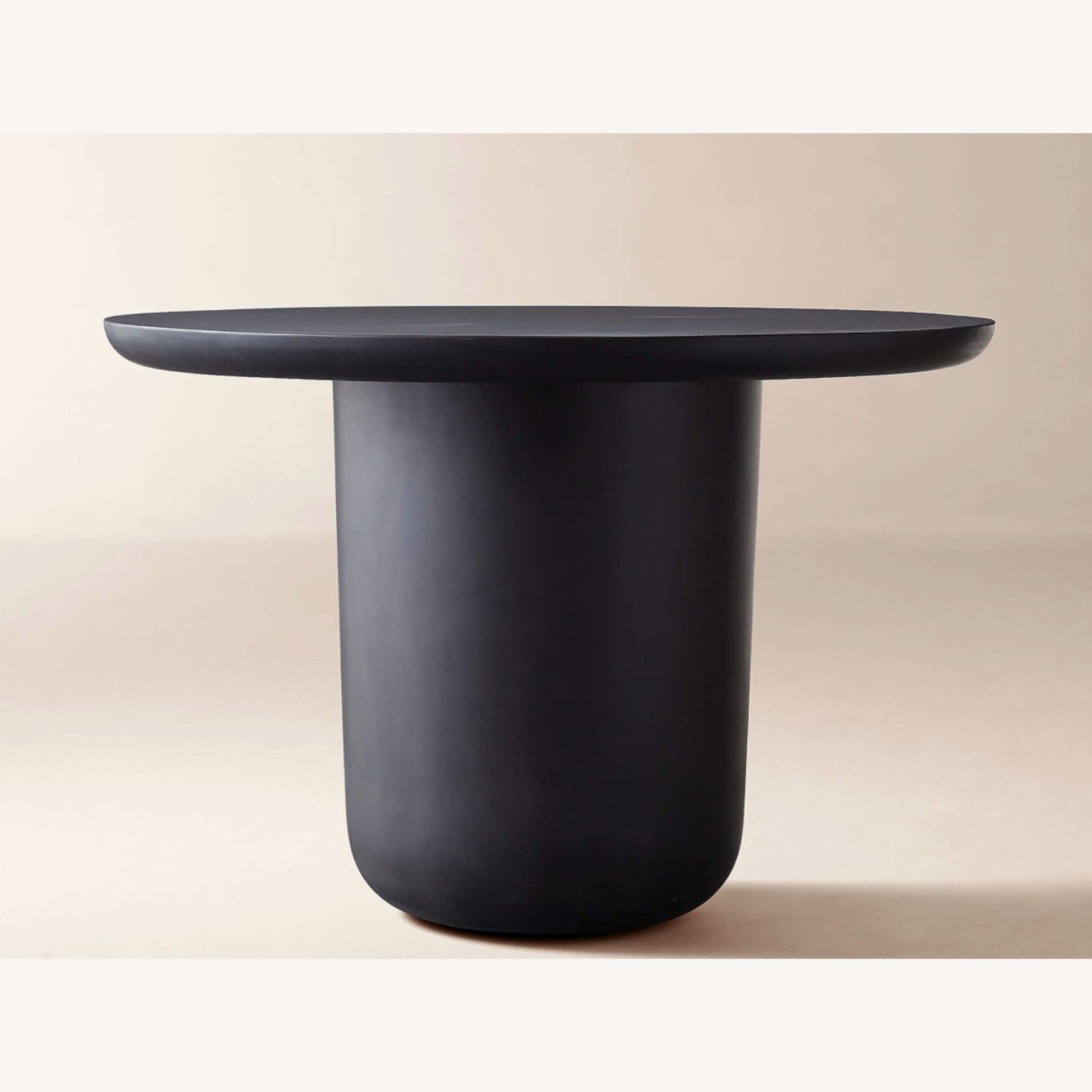 CB2 Lola 45" Round Black Concrete Dining Table - image-0
