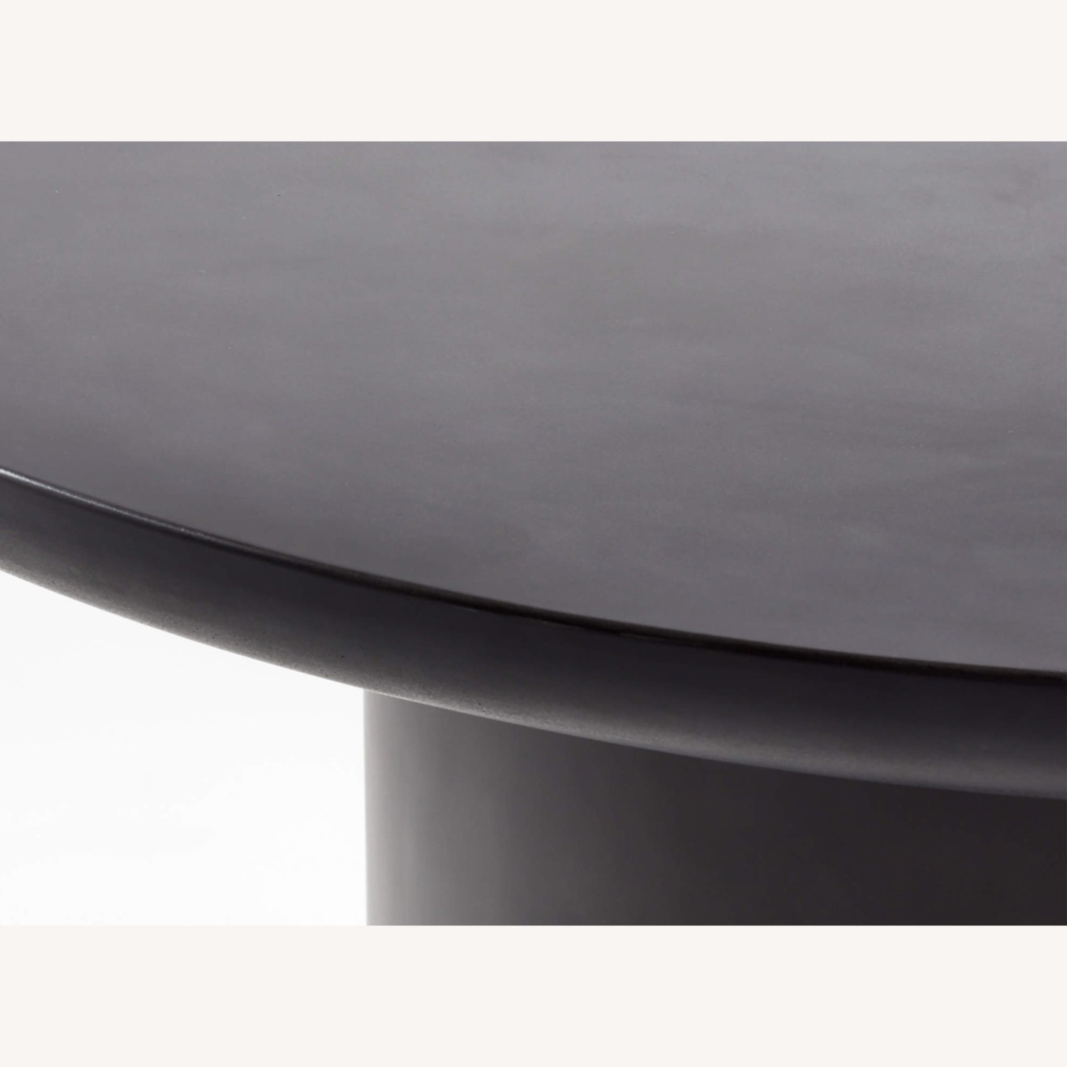 CB2 Lola 45" Round Black Concrete Dining Table - image-1