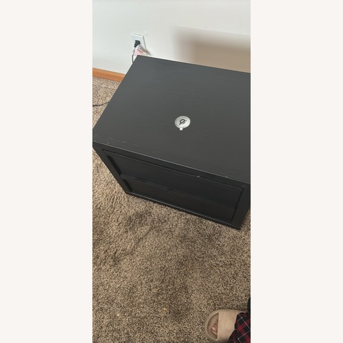 Used Black Wood Queen Bed for sale on AptDeco