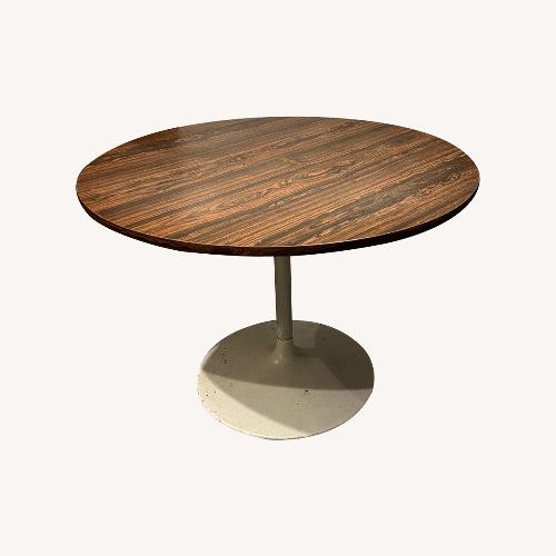 Used Vintage Tulip Round Dining Table for sale on AptDeco