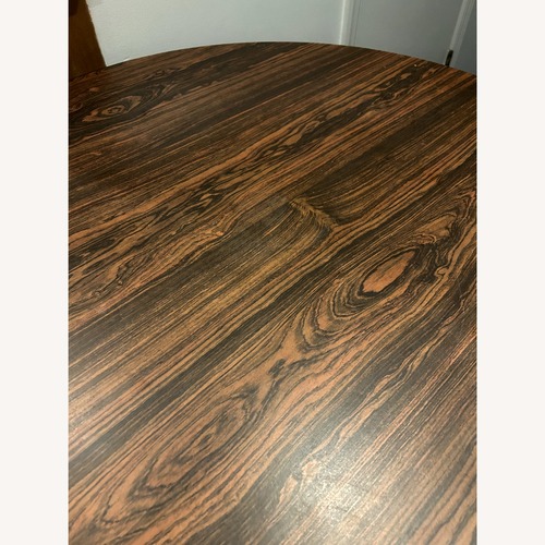 Used Vintage Tulip Round Dining Table for sale on AptDeco