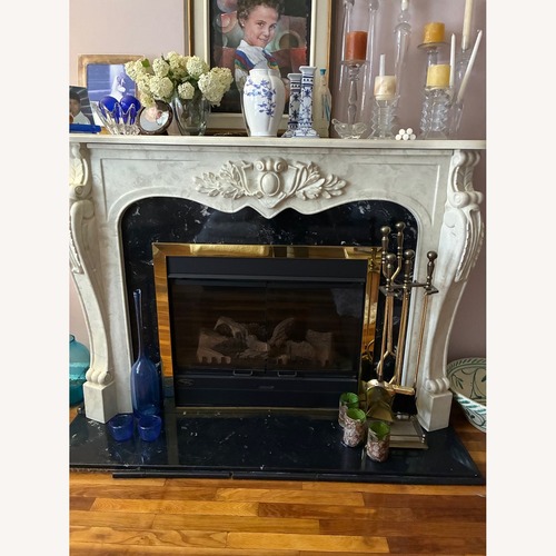 Used Vermont Castings Marble Fire Place (Faux) for sale on AptDeco