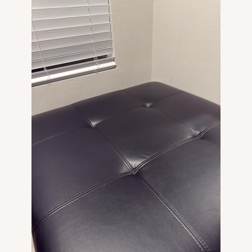 Used Black Leather Ottoman for sale on AptDeco