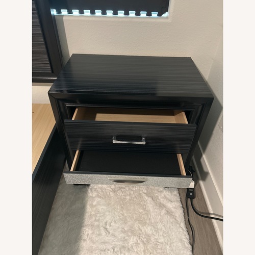 Used Black Wood Nightstand for sale on AptDeco