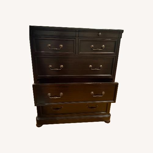 Used Ashley Classic Dark Wood Drawer Dresser for sale on AptDeco