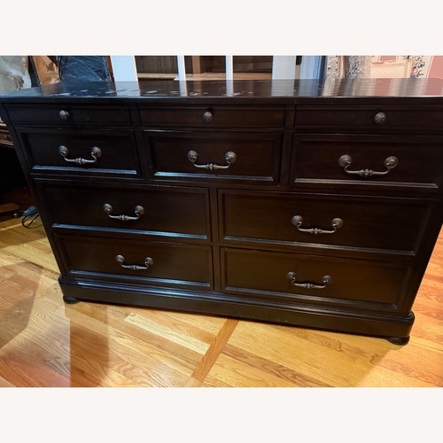 Used Ashley Furniture Dark Brown Dresser for sale on AptDeco