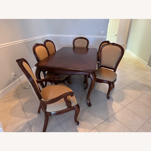 Used Solid Wood Dining Table  for sale on AptDeco