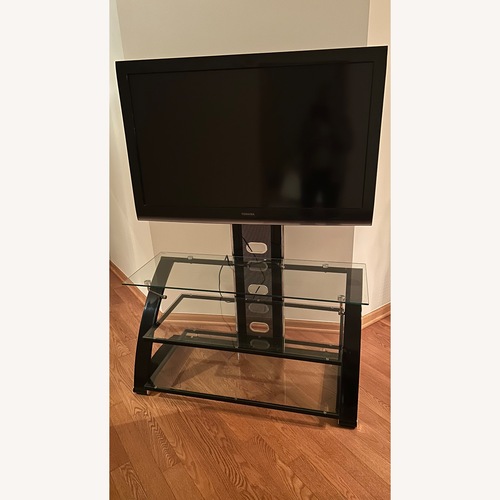 Used Black Glass Wall Unit for sale on AptDeco