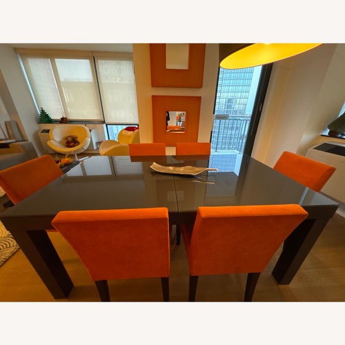 Used Ligne Roset Eureka Dining Table Set with Deco Items for sale on AptDeco