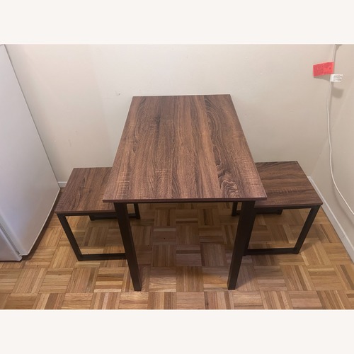 Used Dark Brown Wood Dining Set for sale on AptDeco