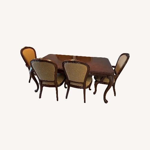 Used Wood Dining Table for sale on AptDeco