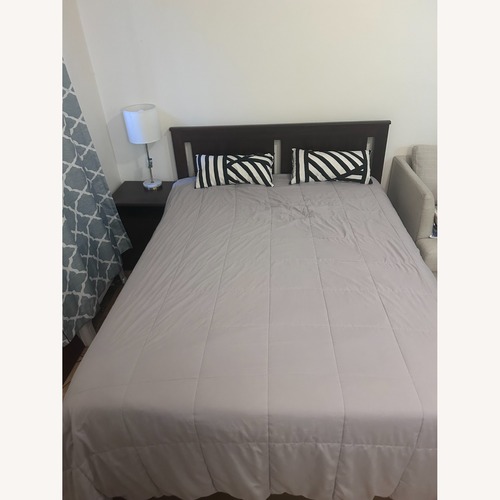 Used IKEA Dark Brown Wood Full Bed for sale on AptDeco