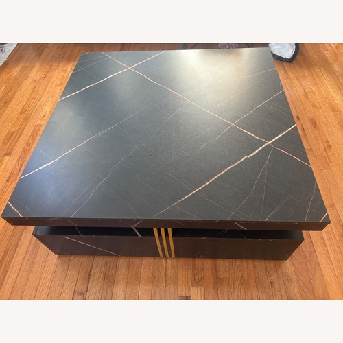 Used Black Wood Coffee Table for sale on AptDeco