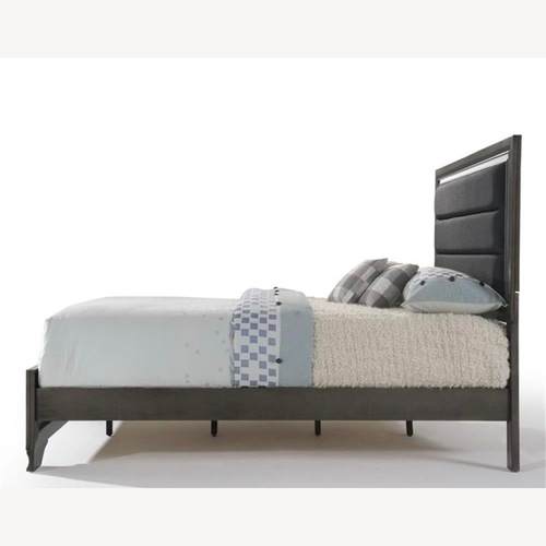 Used Light Gray Queen Bed With Plush Headboard for sale on AptDeco